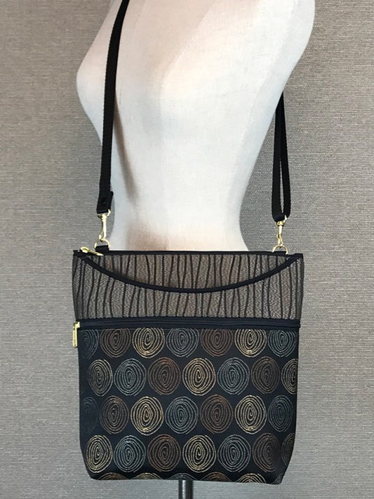 Maggie Purse Getty/Gravity
