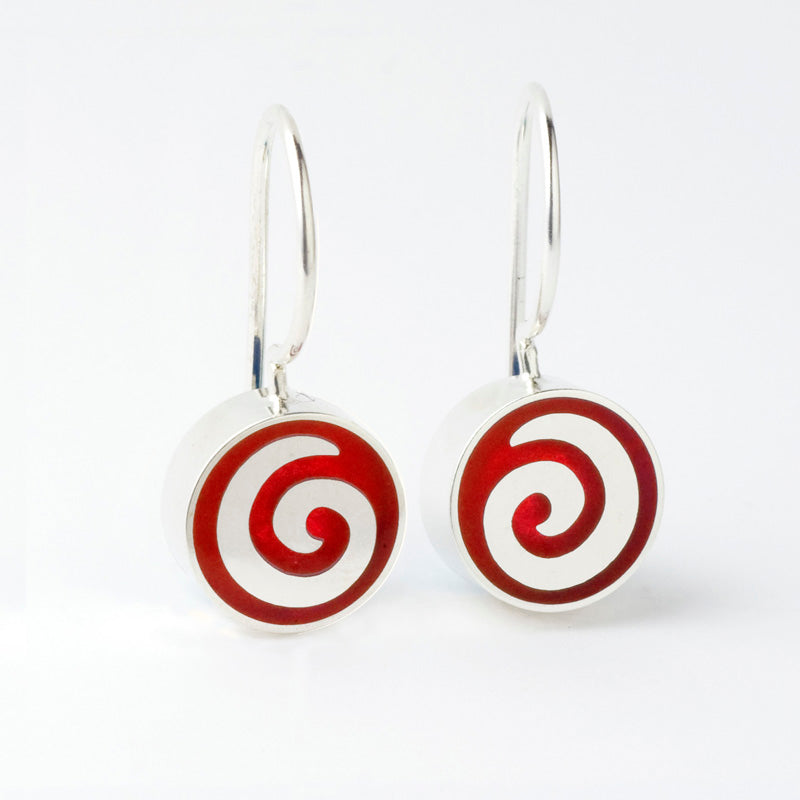 Mini Spiral of Sterling On A Red Backdrop